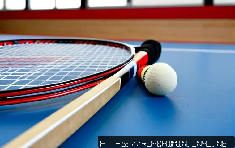 Home 17 배드민턴 라켓 신제품 리뷰 - Photorealistic product review scene of a sleek new badminton racket resting diagonally on a clean in...